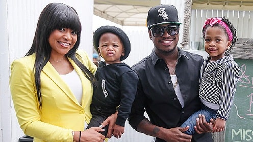 A picture of Monyetta Shaw and Ne-Yo with their kids.